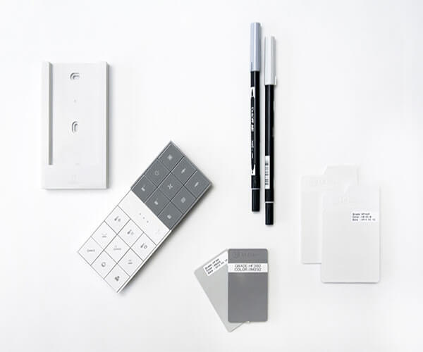 A picture contains two pens and cards